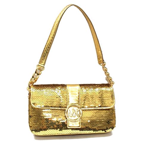 michael kors gold ring black purse|Michael Kors gold evening bag.